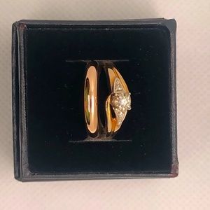 Stamped 10-14KT yellow and white gold lady’s hand made custom ring with band.